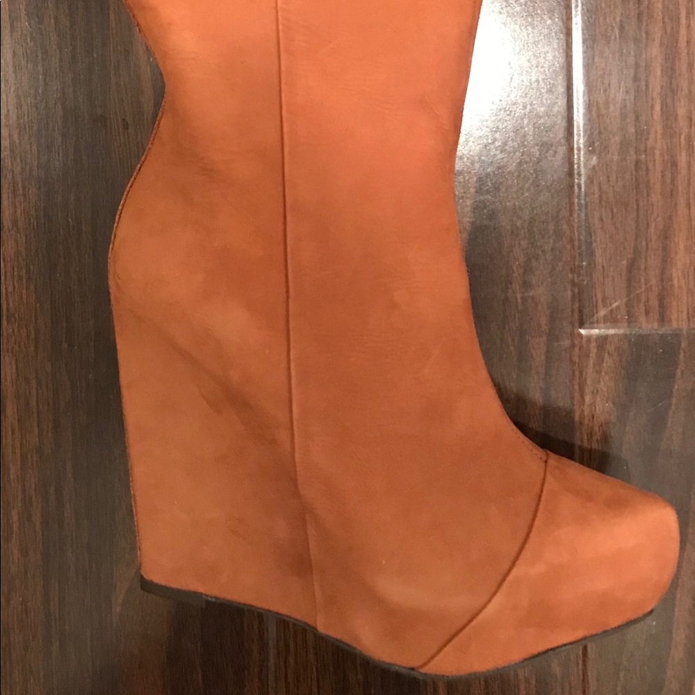 Knee high boutique 9 camel colored wedge boots.